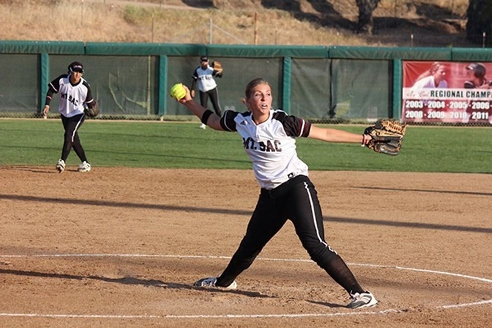 Fully extend and open up your body so you have as much power as possible behind the throw.