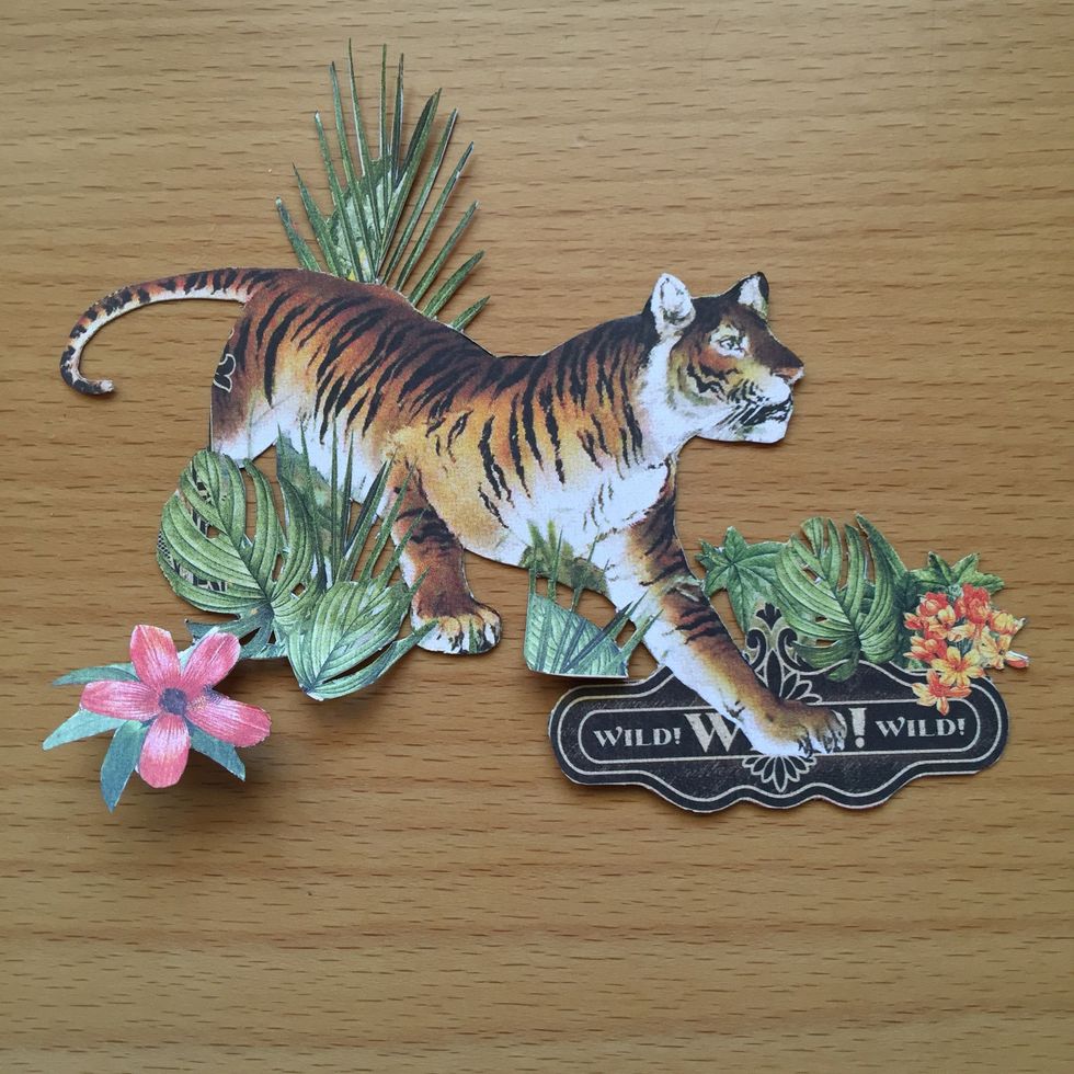 Fussy cut a tiger and some flowers and plants.