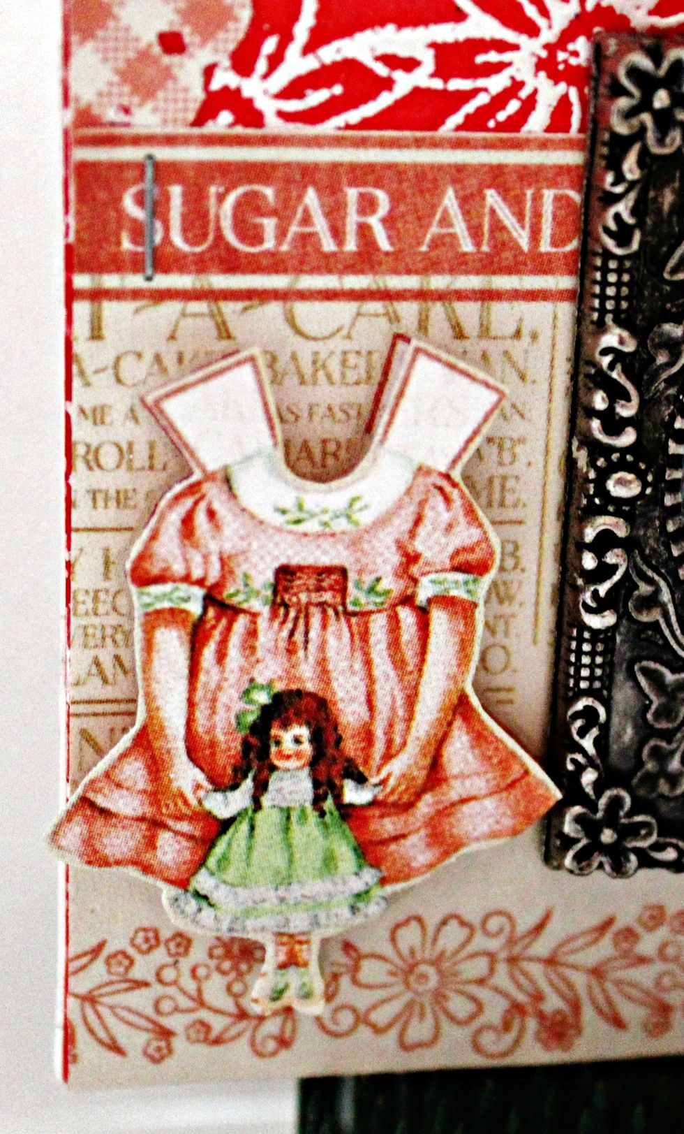 Fussy cut doll dress; place on tag front with pop dots.