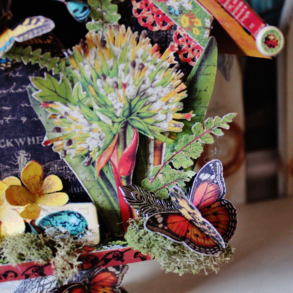 Fussy cut images from pattern paper. Add to front of birdhouse.