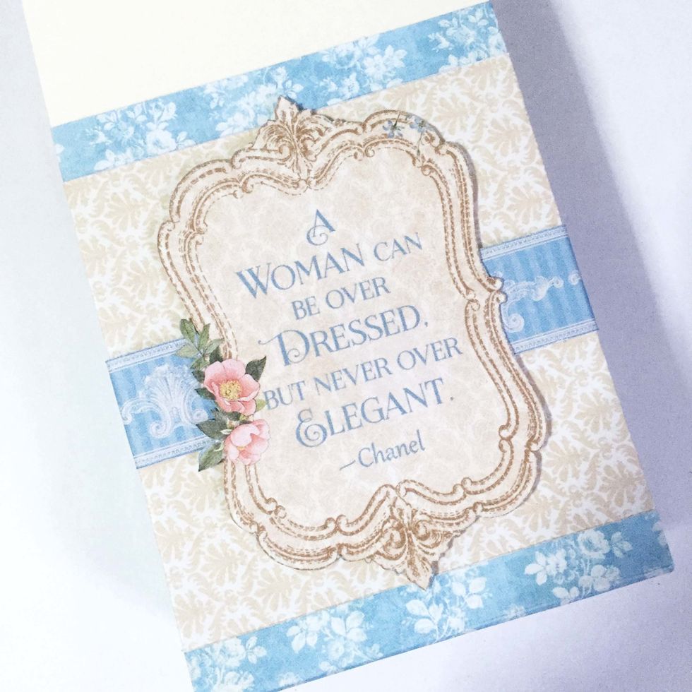 Fussy cut out a phrase of your choice (or any other images you preferred) and glue it over the back of the box.