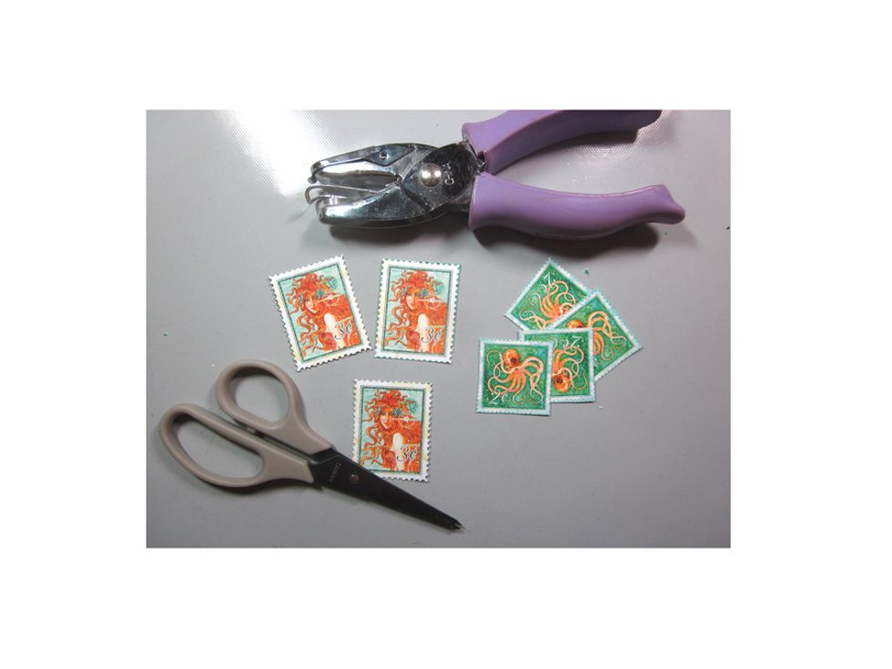 Fussy cut out some of the decorative elements from the paper. These are some little stamps and I find a tiny hole punch will help you punch those scalloped edges.