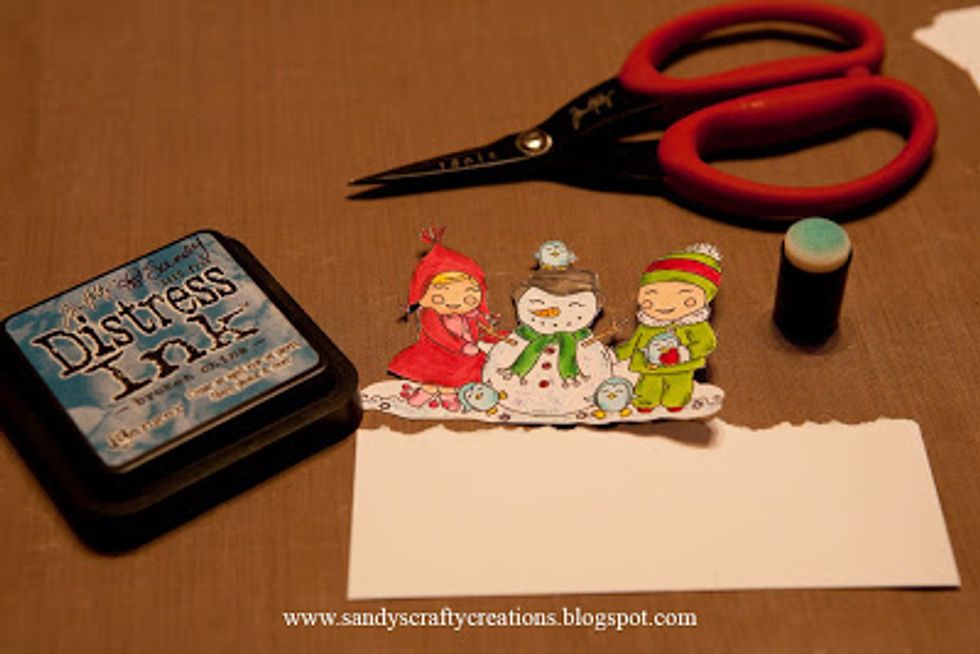 "Fussy Cut" out your image with sharp scissors. I use the Tim Holtz scissors for best results.