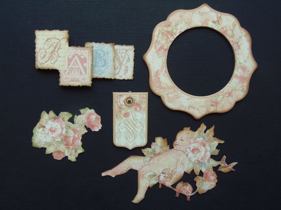 Fussy cut some elements and chipboard. Set aside for now.