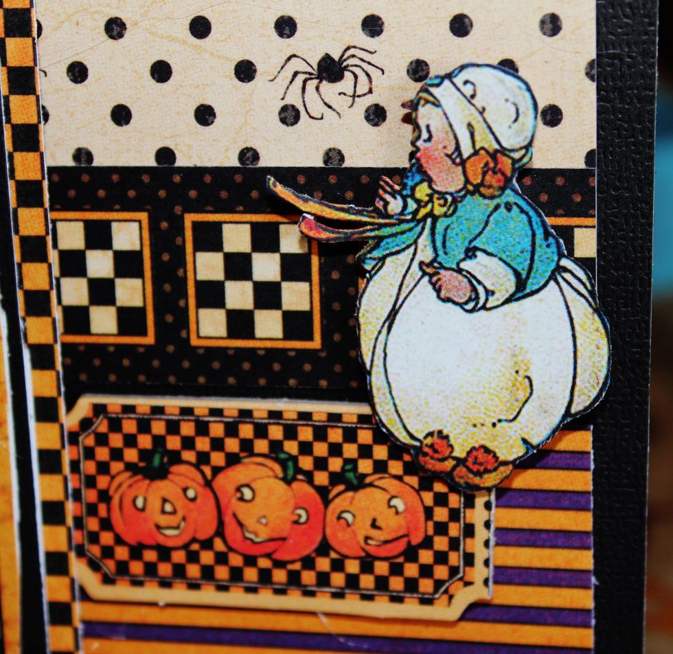 Fussy cut some images; add to front with pop dots. Add chipboard to front of card.