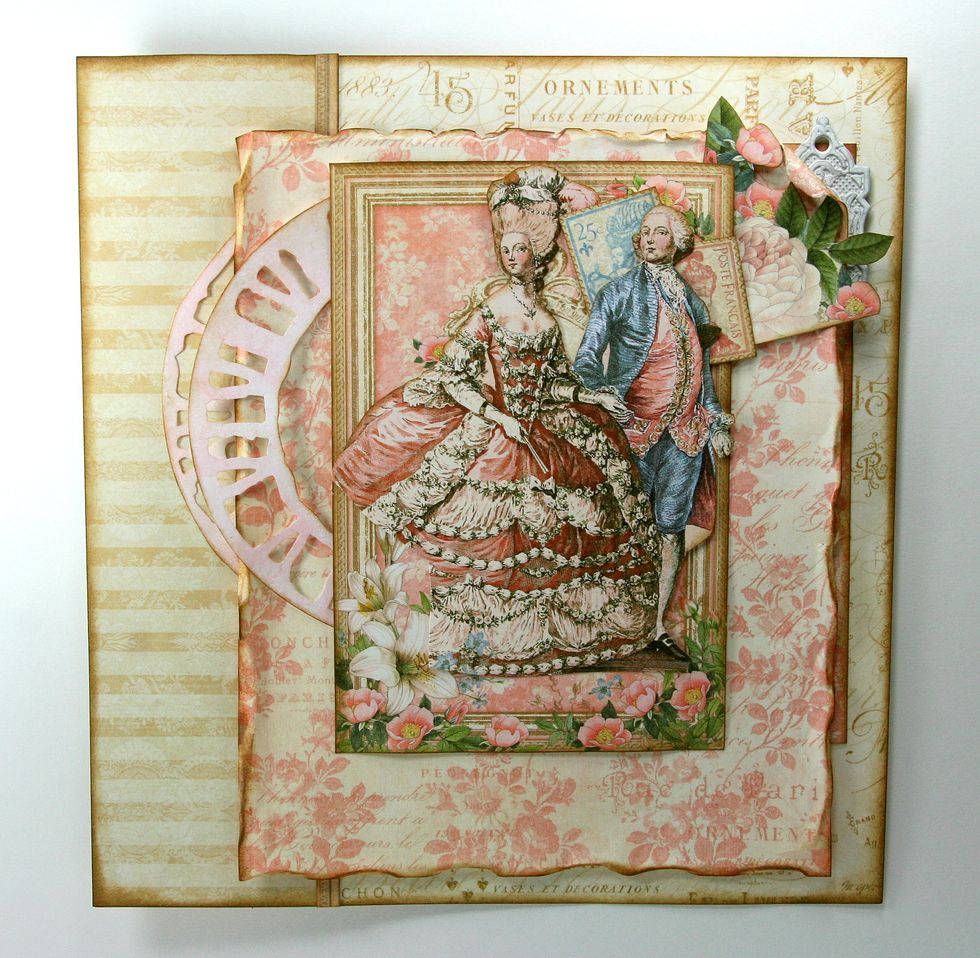 Fussy cut vintage couple image from G45 Gilded Lily. Ink well and position on the center of cut apart.