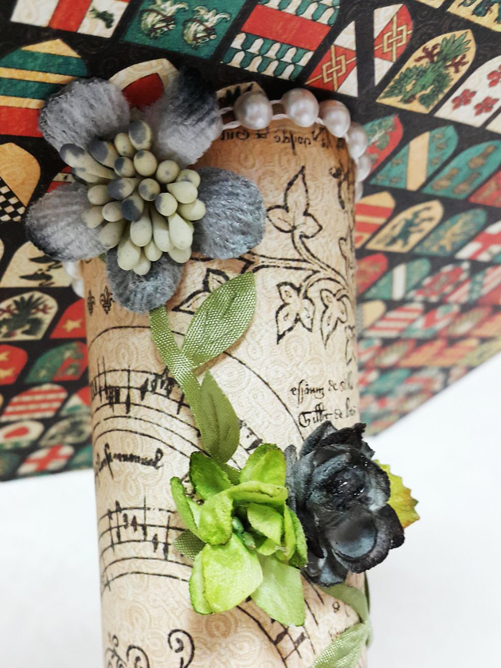 Fussy cuttings and flowers are nice to add on the cylinder as well