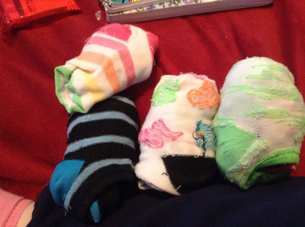 Future gloves and sock monkeys. Keep in craft drawer.