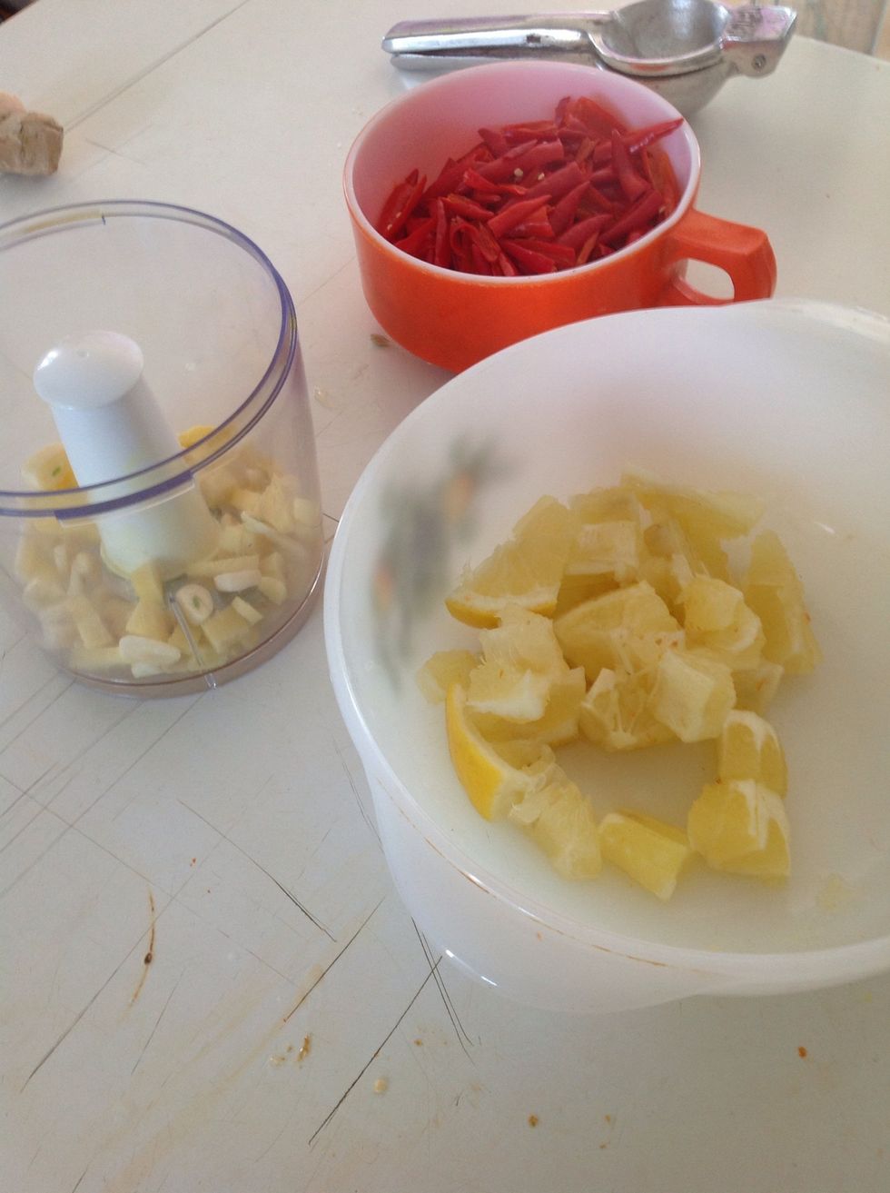 Garlic and ginger in the food processor. I chopped the lemon after cutting away the peel on 2/3 of them because I didn't want too much pith/peel but otherwise I would have left a little more on.