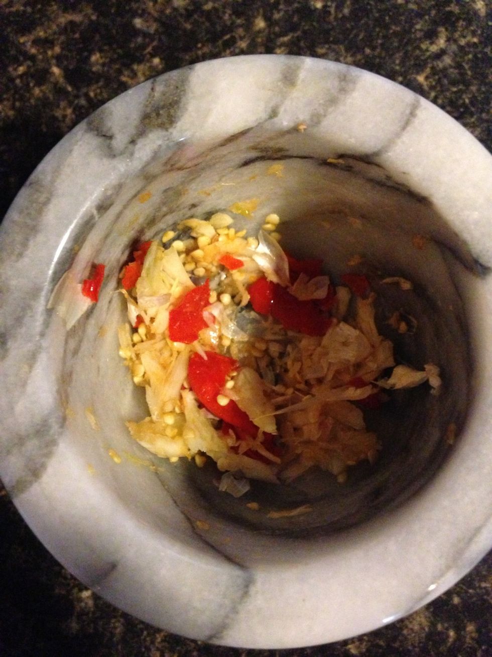 Garlic and red peppers smashed together