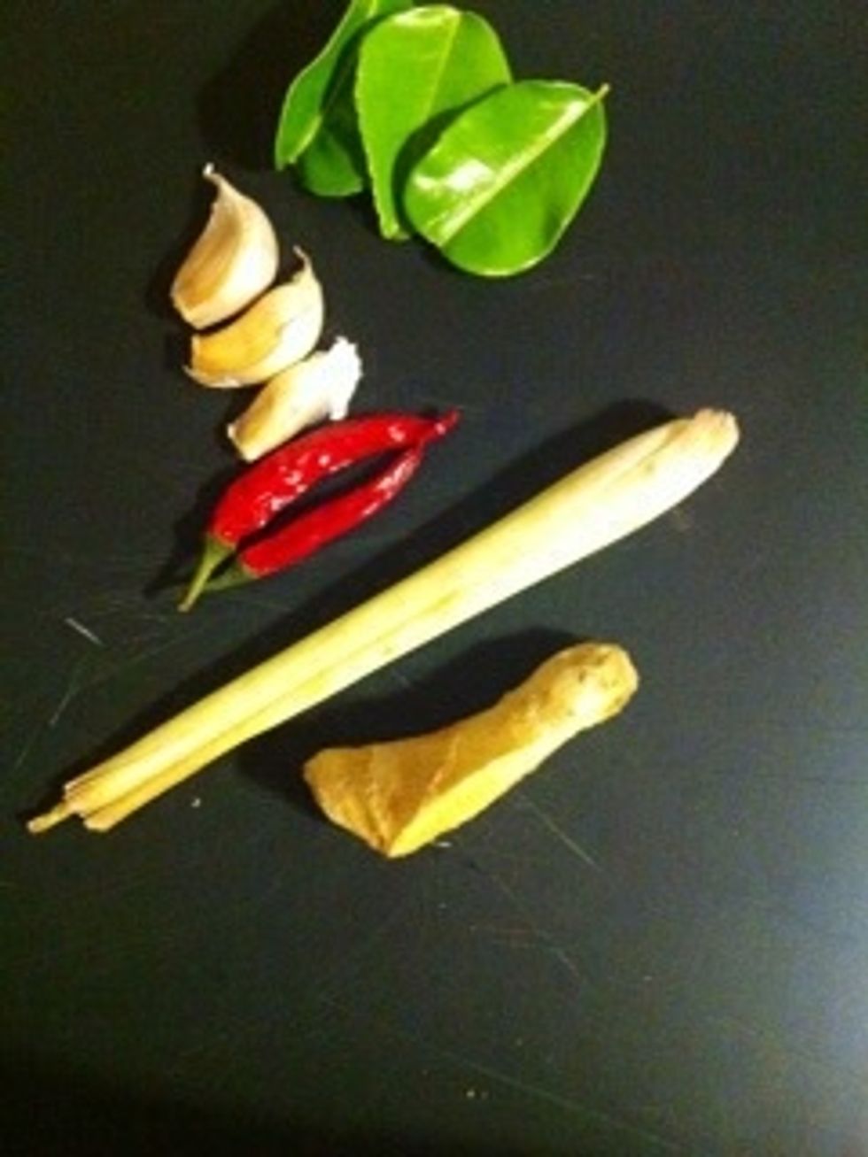 Garlic chillies ginger and upper part of lemongrass blend it together and put aside for later