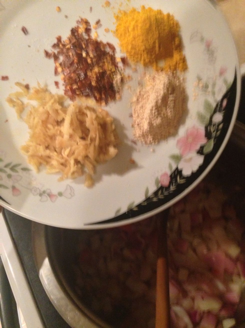 Garlic, ginger, salt, turmeric and red chilli