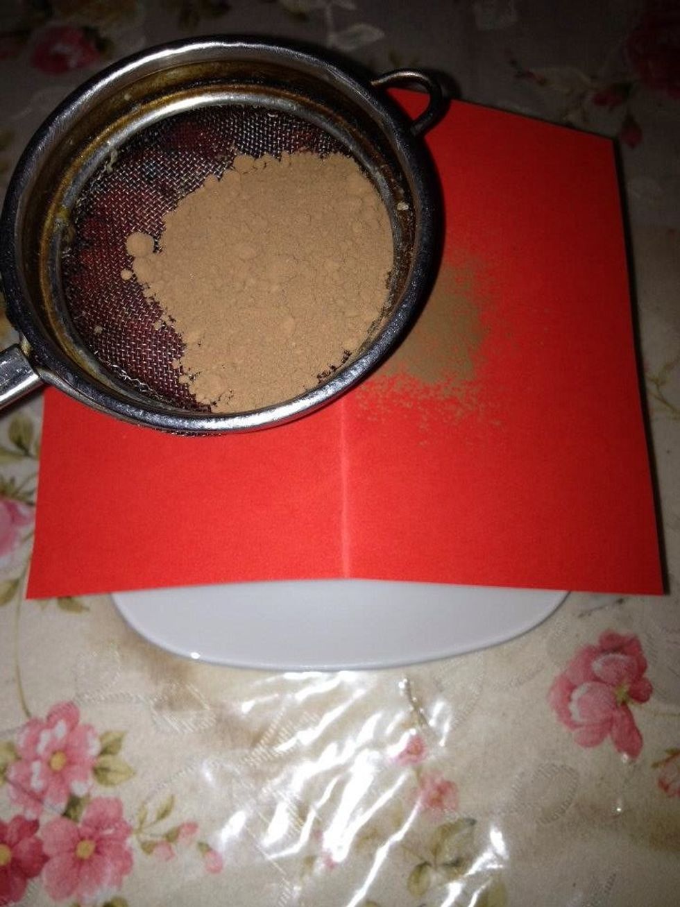 Garnish it with cacao powder.