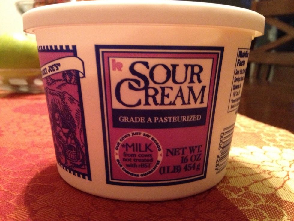 Garnish tamale pie with sour cream (and green onion/cilantro if desired).