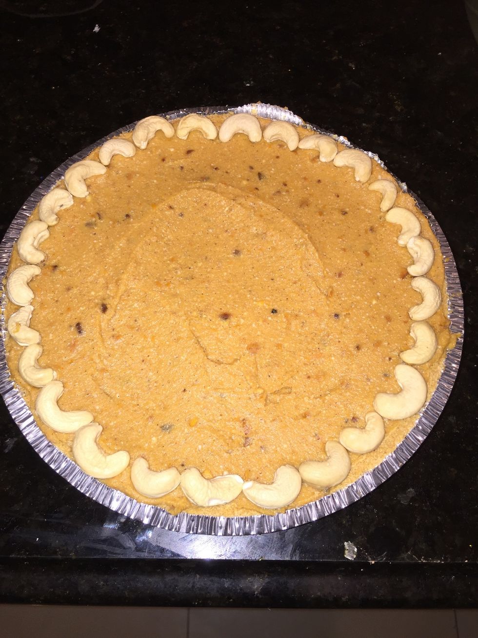Garnish with cashews for faux crust look! Place in oven for 50 mins!
