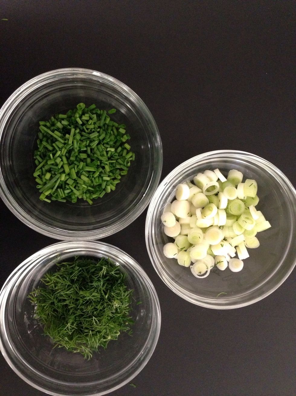 Garnish with cut chives, dill, and scallions