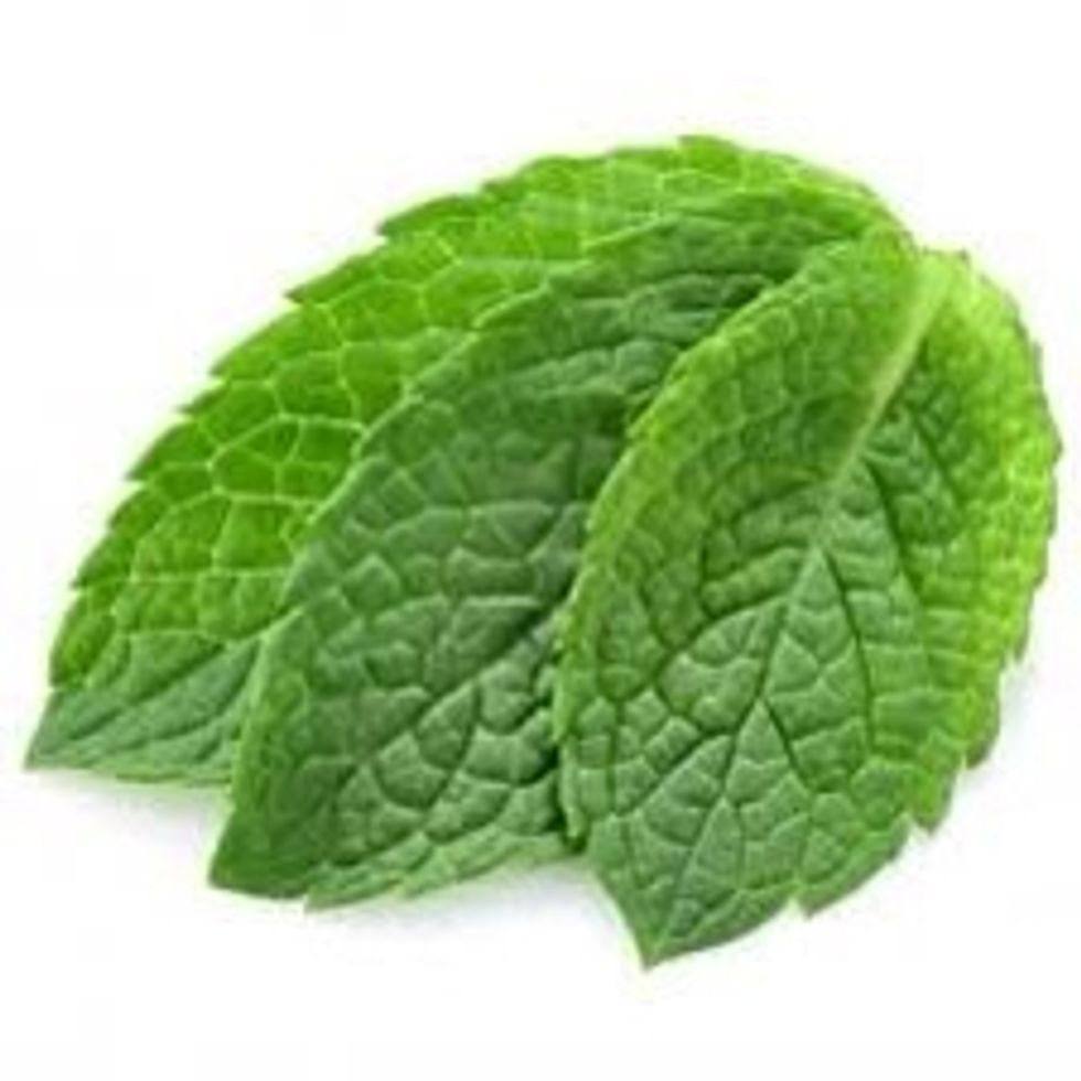 Garnish with mint leaves and cherries