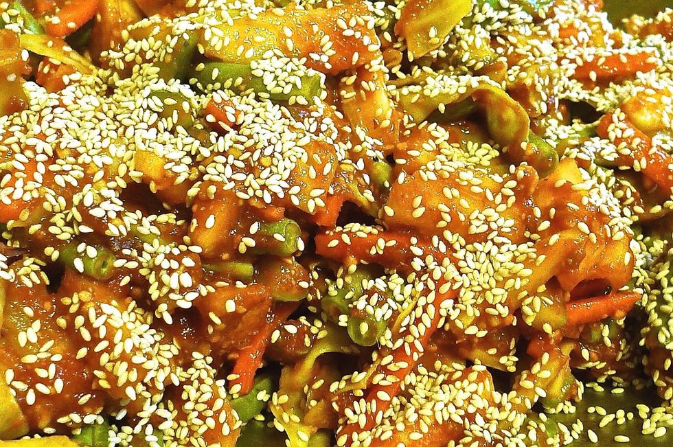 Garnish with toasted white sesame seeds.