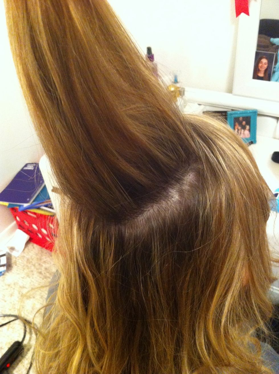 Gather a large amount of hair on the top of your head