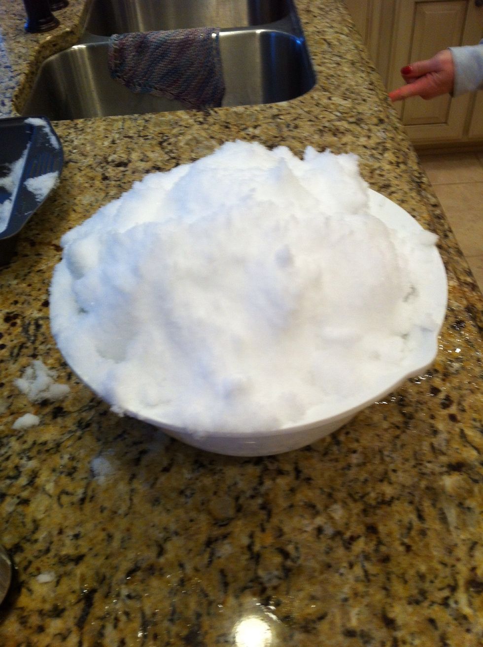 Gather a large mixing bowl of fresh snow.