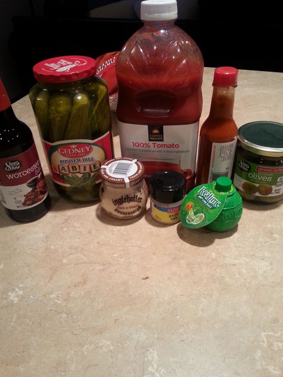Gather all the Supplies. *tomato juice or vegetable juice cocktail, chilled *lime juice *Worcestershire sauce *horseradish *hot pepper sauce *garlic salt *ground black pepper