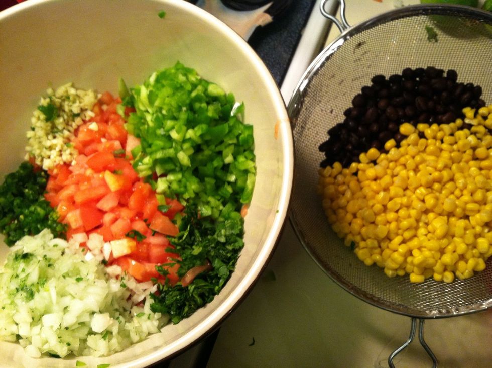 Gather all your chopped ingredients, corn and black beans.