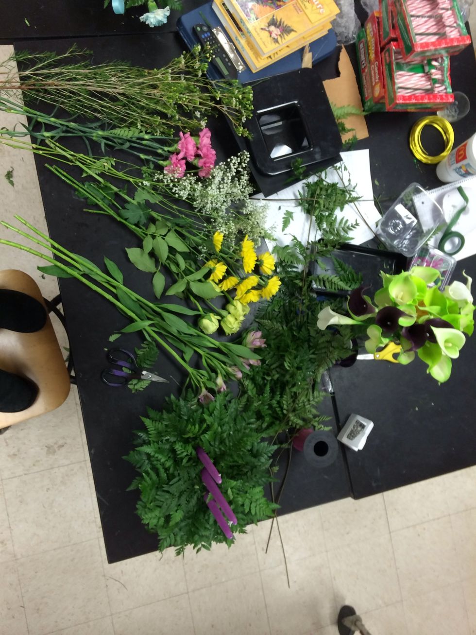 Gather all your flowers and materials needed