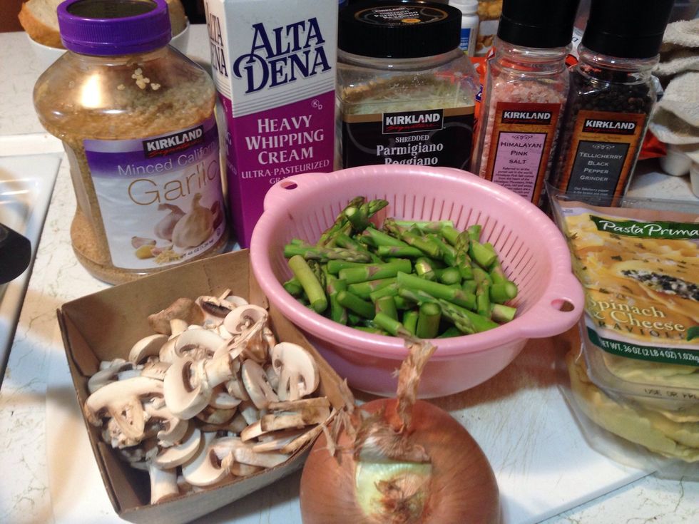 Gather all your ingredients. Cut the asparagus to small pieces.