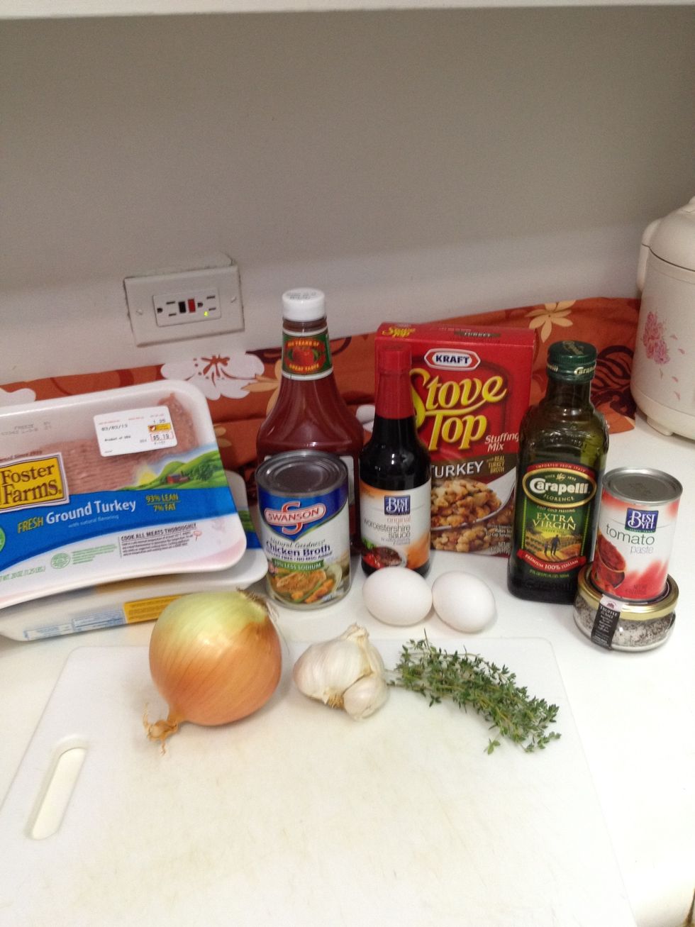 Gather all your ingredients together and begin prep work.   Start with dicing your onion and 3 cloves of garlic.  Remove the tiny leaves off of the stem to make 1 tsp of thyme leaves.