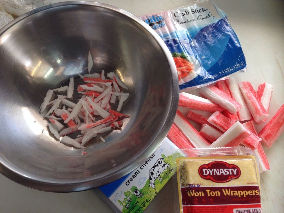 Gather all your ingredients. You need to shredded your crab stick.