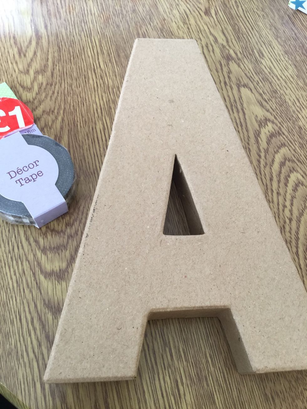 Gather all your item you will need: scissors, washi tape and the letter of your choice