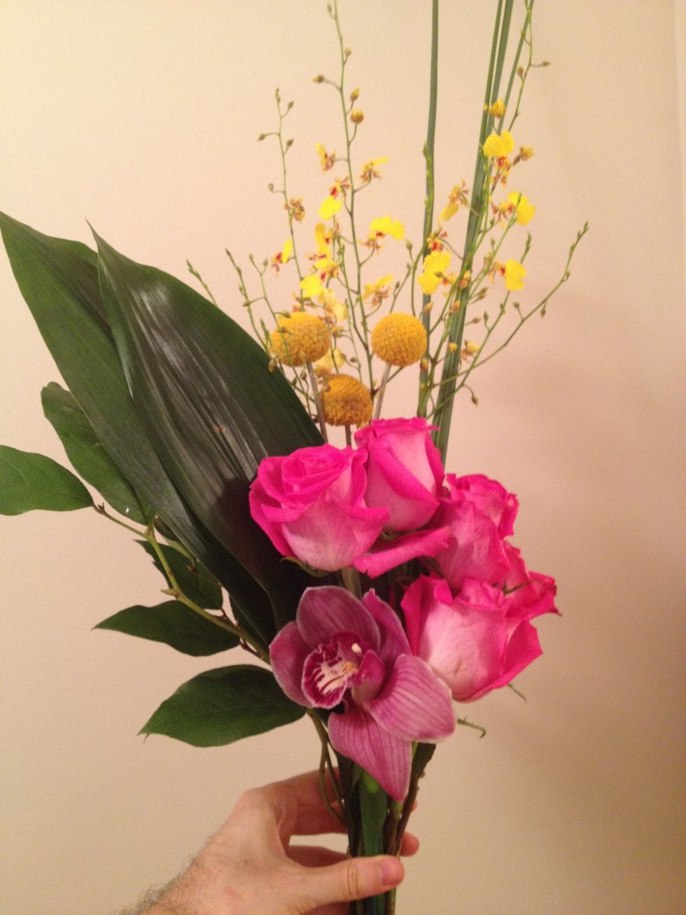 Gather and trim all of your loose flowers. Remove excess leaves.