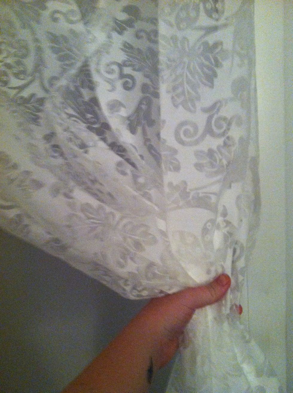 Gather curtains in the middle