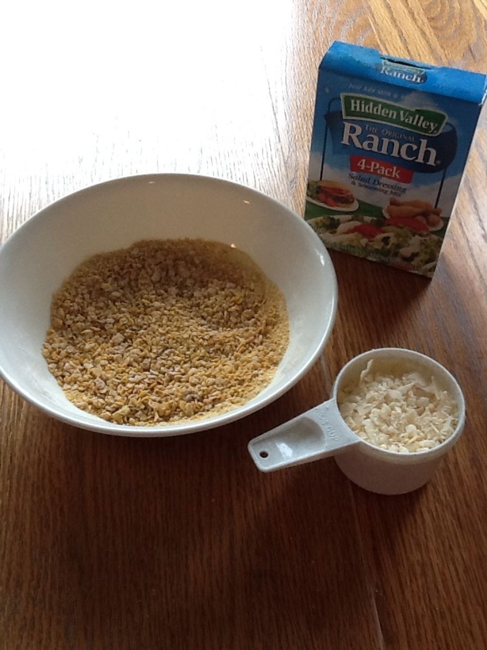 Gather dry ranch dressing mix and grated Parmesan cheese and add to cornflakes.