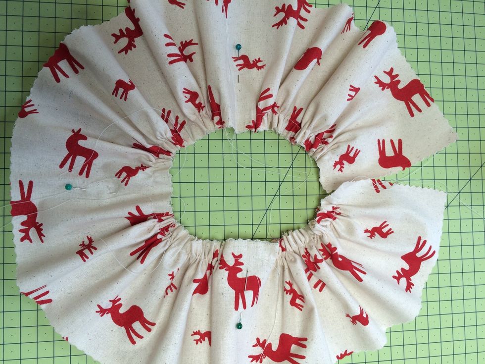 Gather each strip from pin to pin ( four sections)