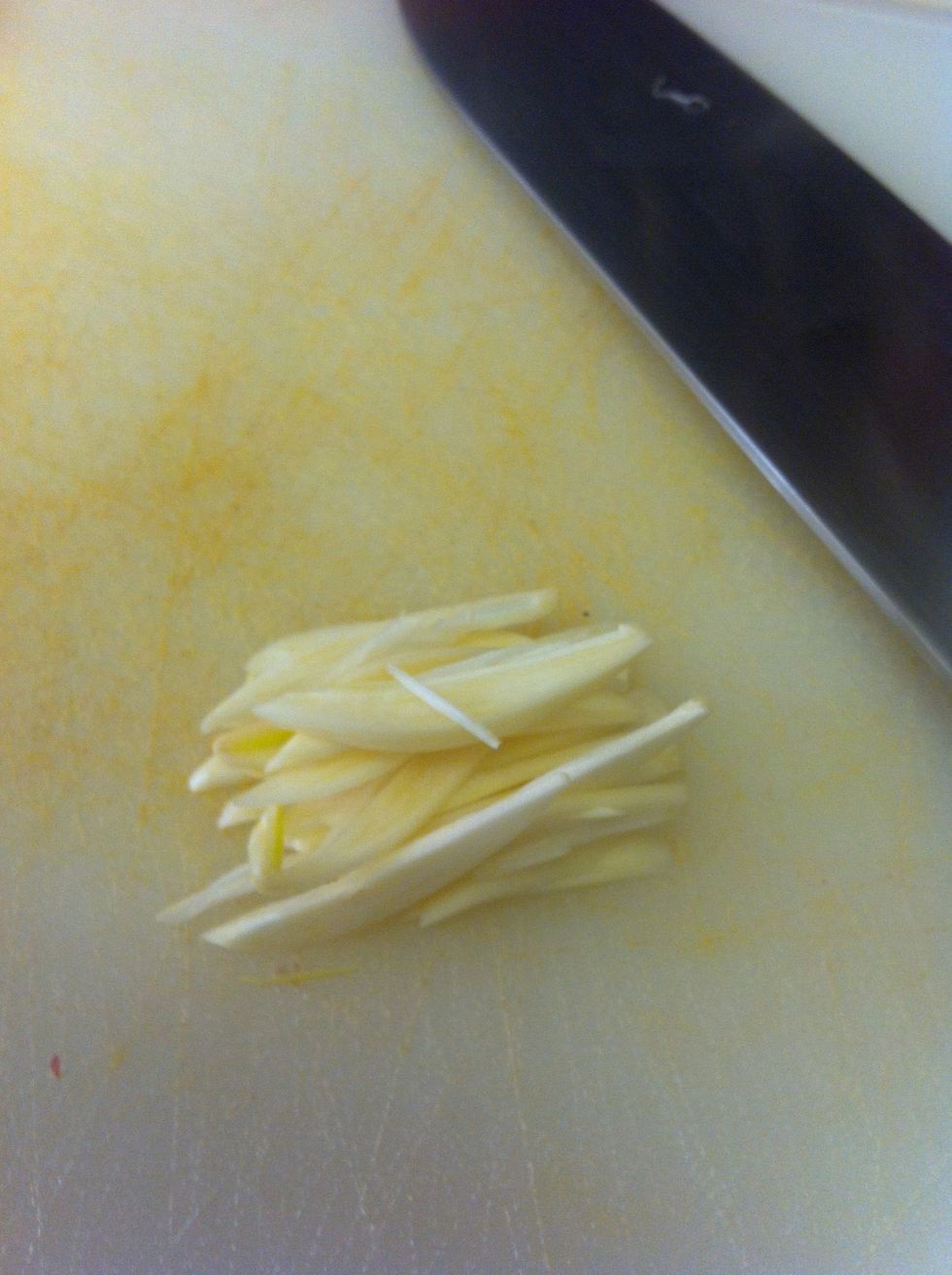 Gather garlic and then chop it into small diced pieces