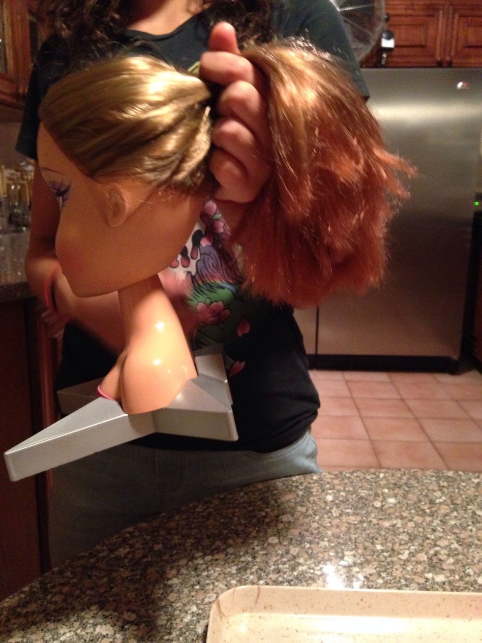 Gather hair up into a ponytail