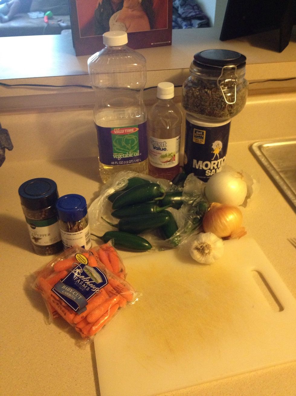 Gather ingredients. Cut carrots in to small circles and onion in to half circles.  Optional: add Nopales (cactus) / pigs feet to the mix as well. Just make sure the feet are well cooked first.