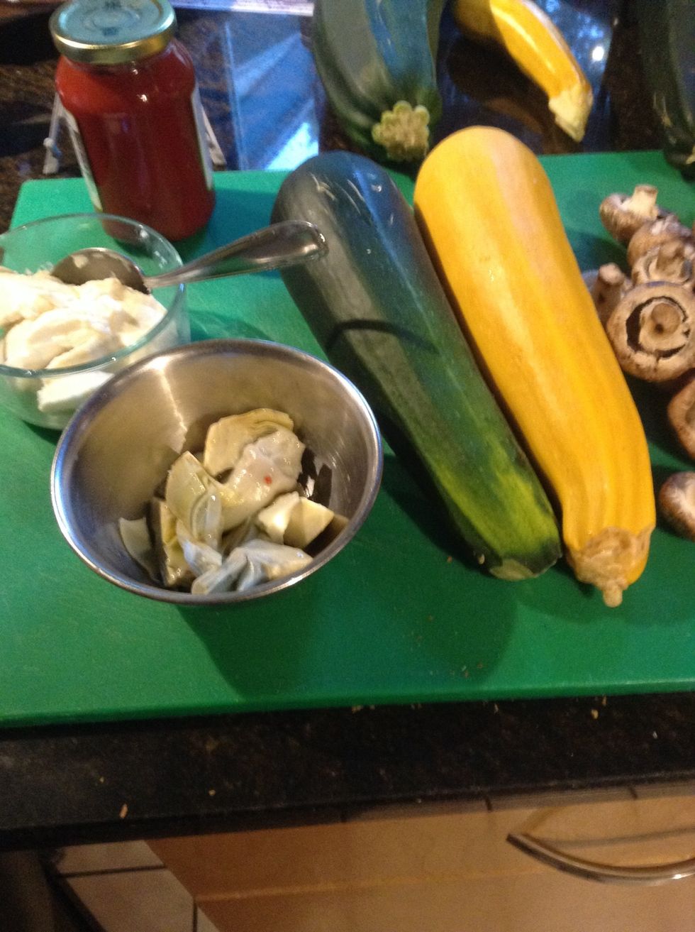 Gather ingredients for slicing prior to assembly of the lasagna. Pre-heat oven to 325F.