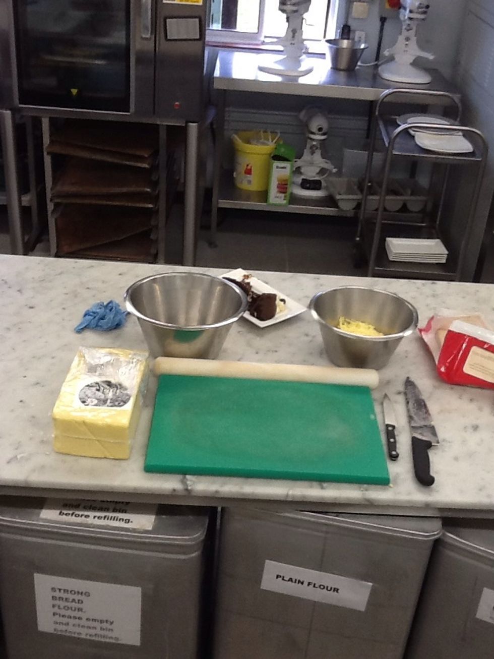 Gather ingredients for your turn overs, must have puff pastry. Optional fillings, tomatoes, grated cheese and onion.