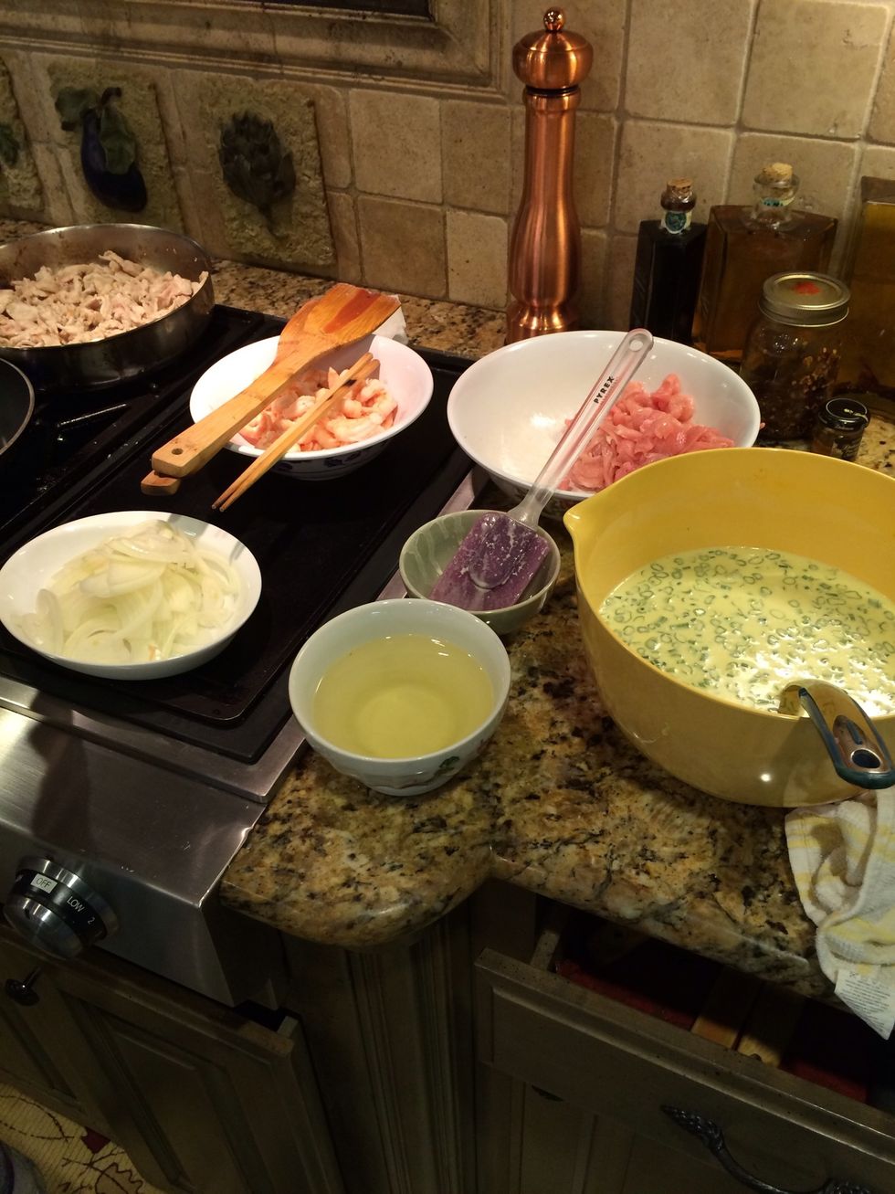 Gather ingredients- pork, shrimp, onions, batter mix, and vegetable oil.