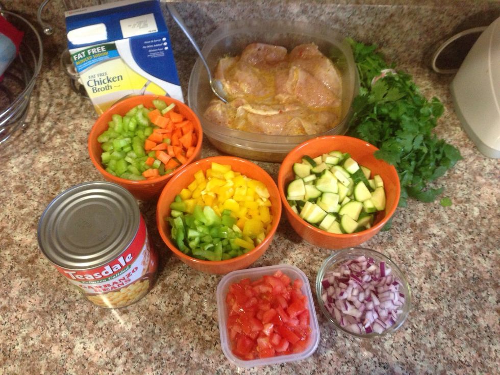 Gather ingredients, season chicken to your taste, cut up veggies.