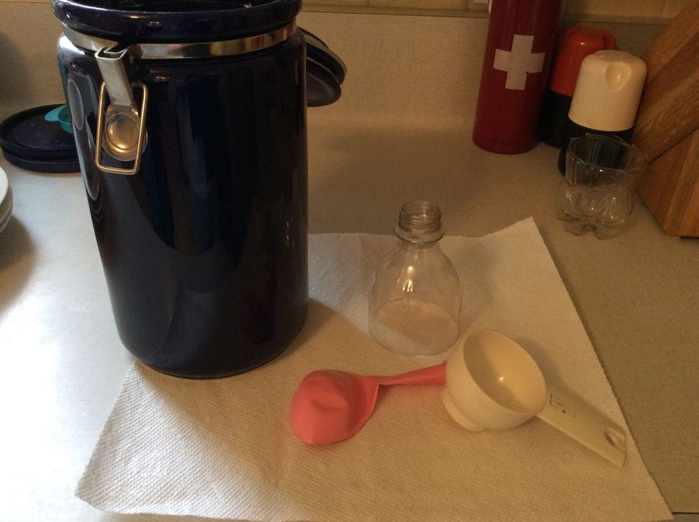 Gather supplies and cut the top off of the water bottle