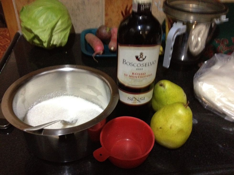 Gather supplies and mix sugar water wine spices and orange peel in a small pan. Bring the liquid to a boil