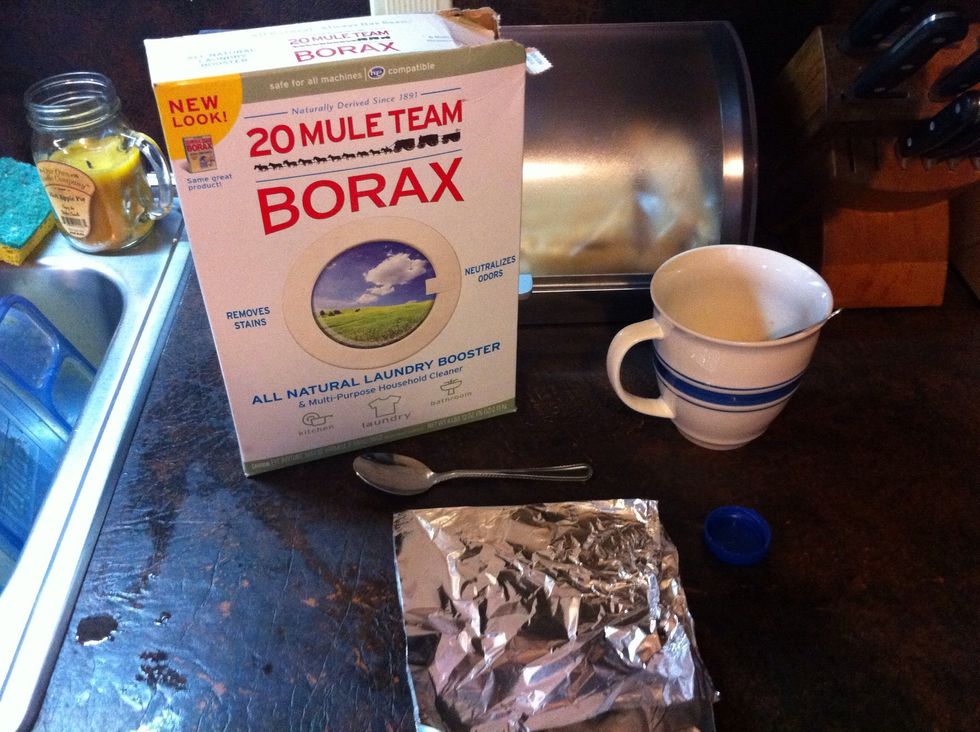 Gather supplies: Borax, Bacon Grease, spoons, plastic lid, foil to mix paste on.