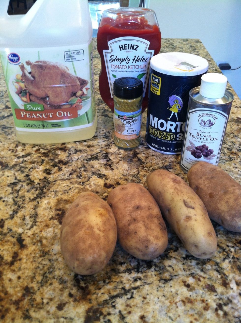 Gather supplies. Go ahead and mix together ketchup and curry powder. There is not a set ratio, just however much flavor you want.