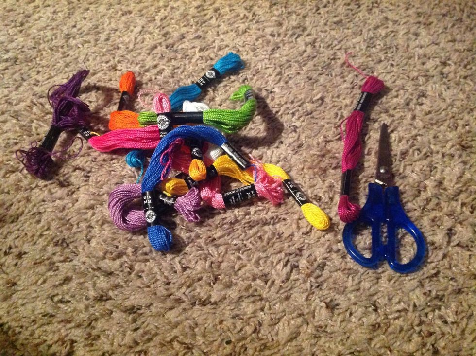 Gather supplies. I'm not sure what the string is called but I've always called it colored knitting string because I use it for knitting but that's the kind of string you need