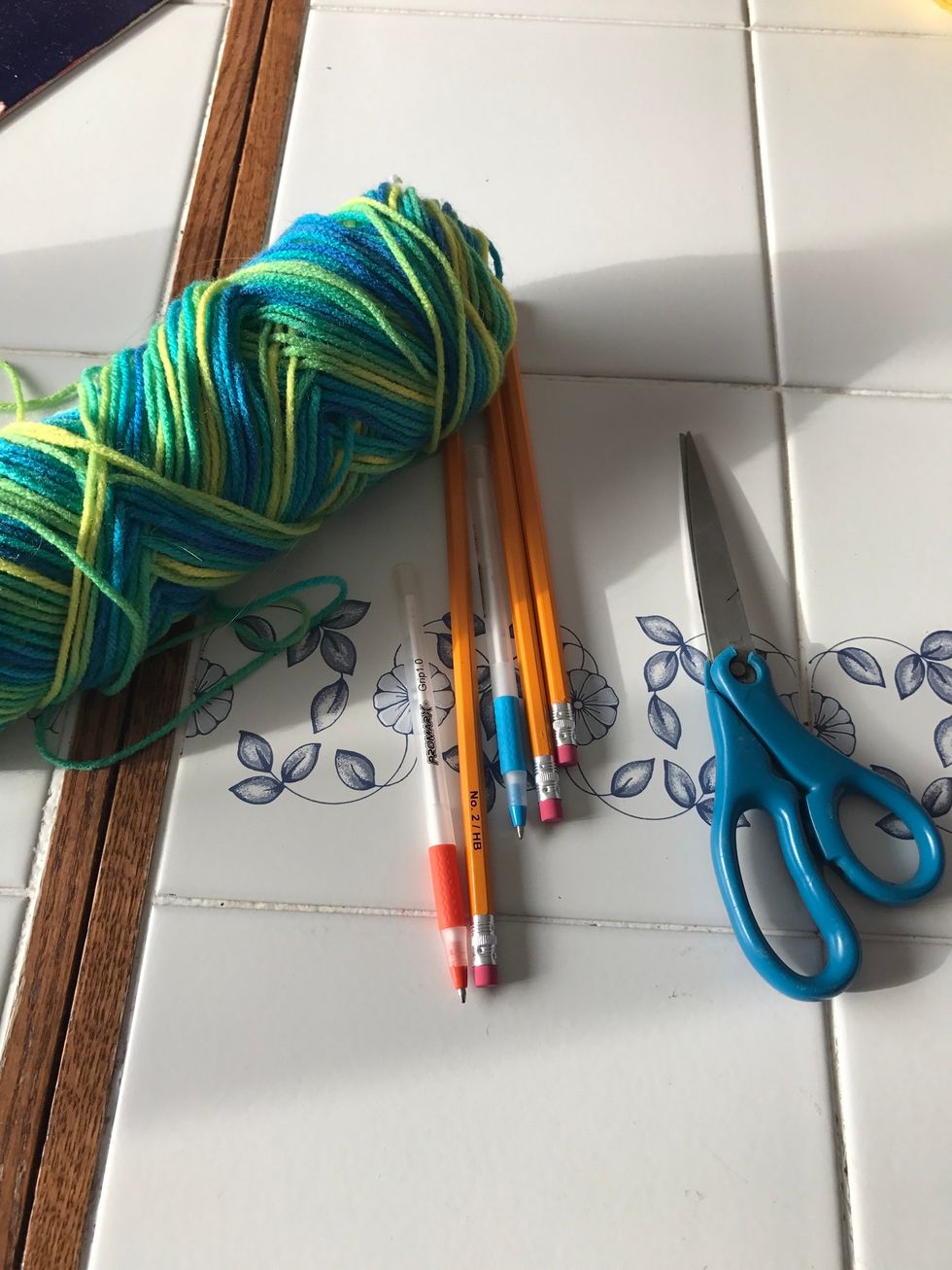 Gather supplies, the pen is optional, in going  o put a Pom Pom on top.  Yarn is from the hobby lobby Brand=love this yarn