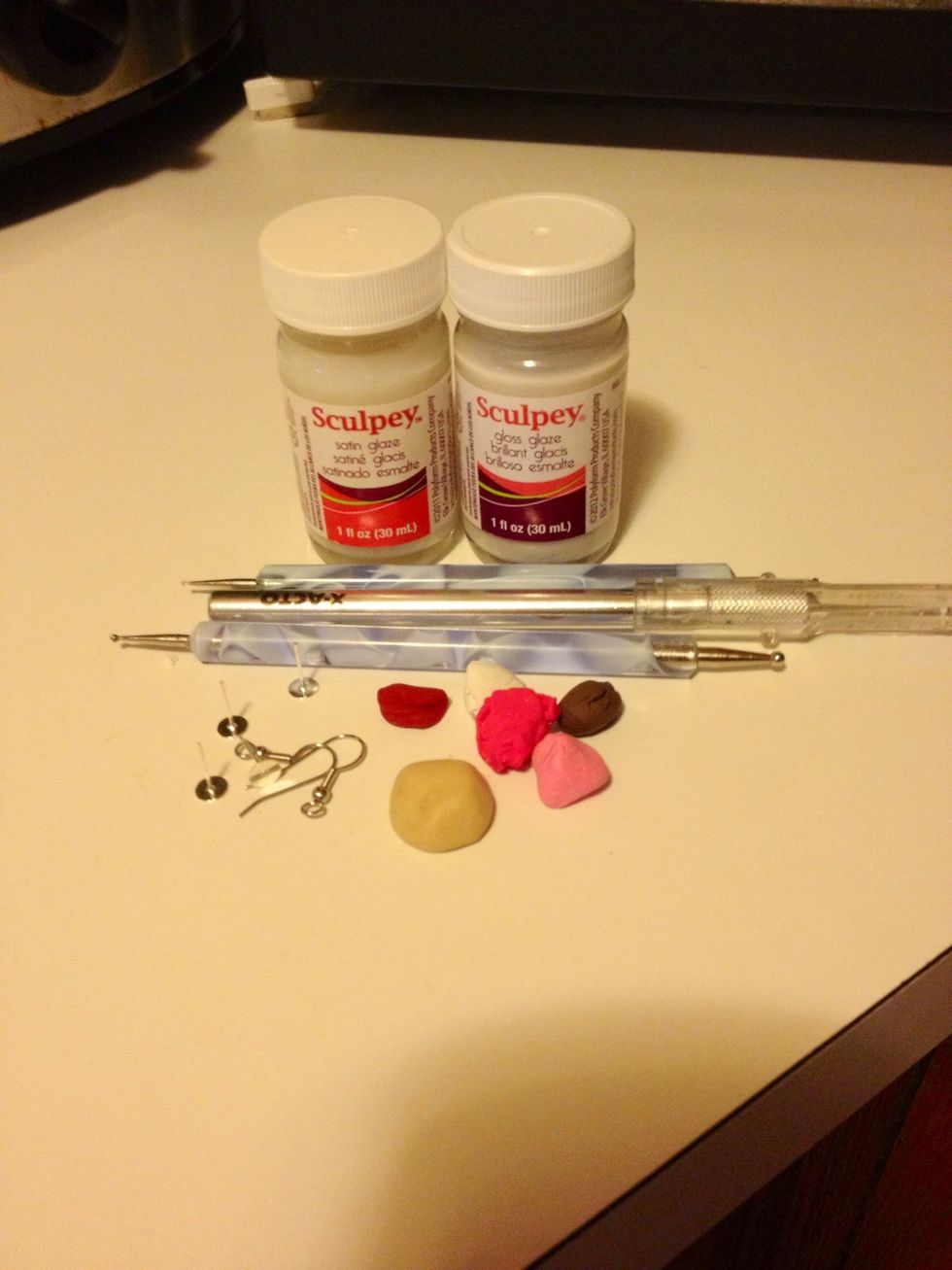 Gather Tan and other colors of clay, ball tools, glazes and jewelry findings.