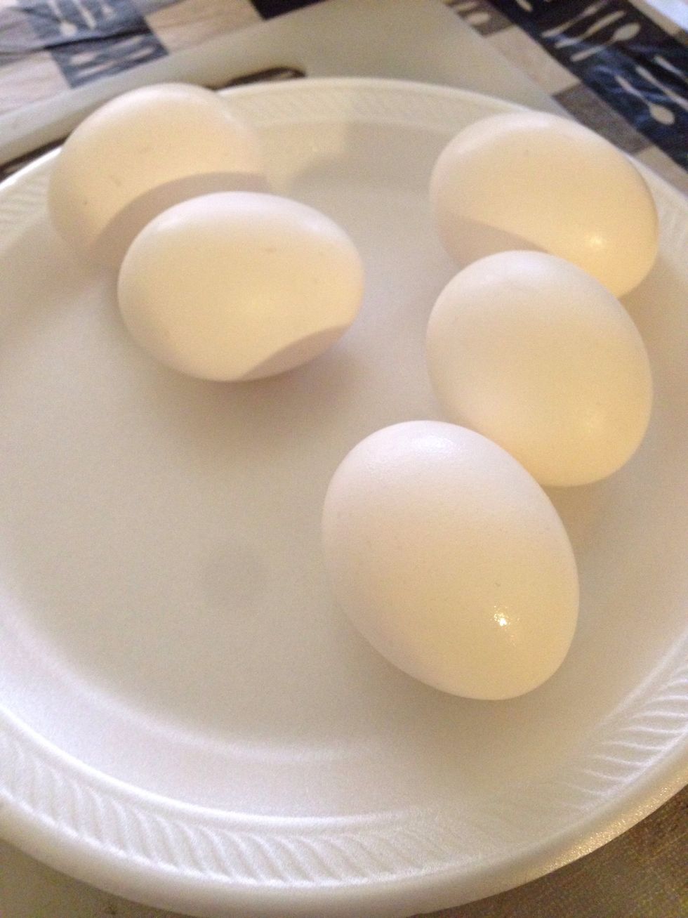 Gather the eggs you will be using for the salad.